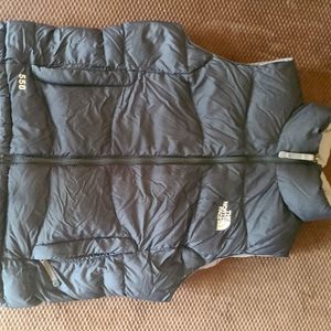 North Face vest. Black. Down filled. Medium. Food condition.